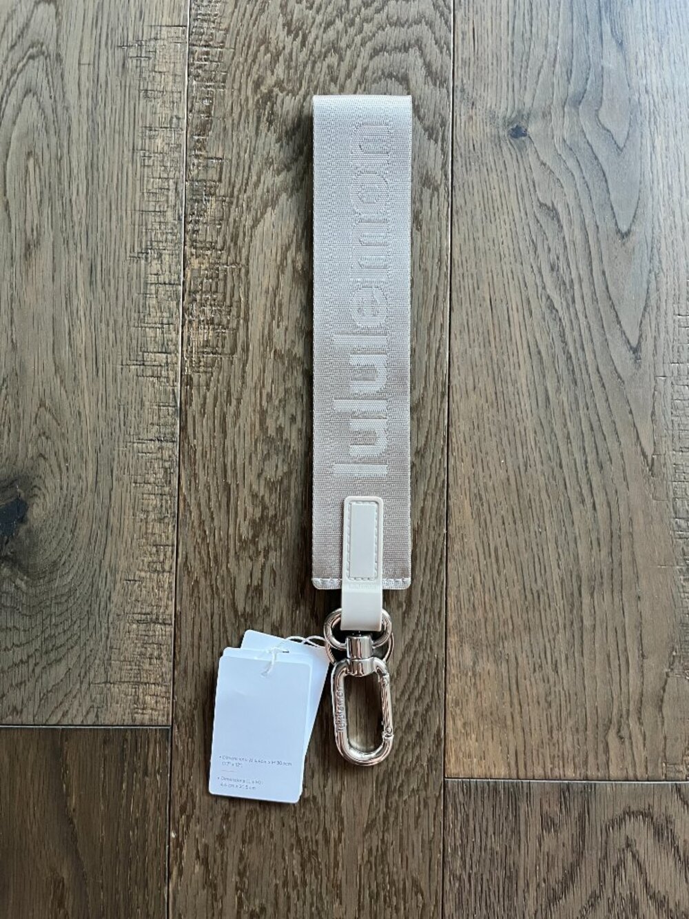 Lululemon Never Lost Keychain NWT Large Tan Ivory Silver Accessory - Picture 3 of 4